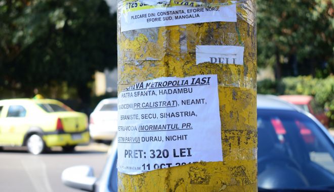 Persoanele care lipesc afişe pe clădiri şi stâlpi, amendate de poliţiştii locali